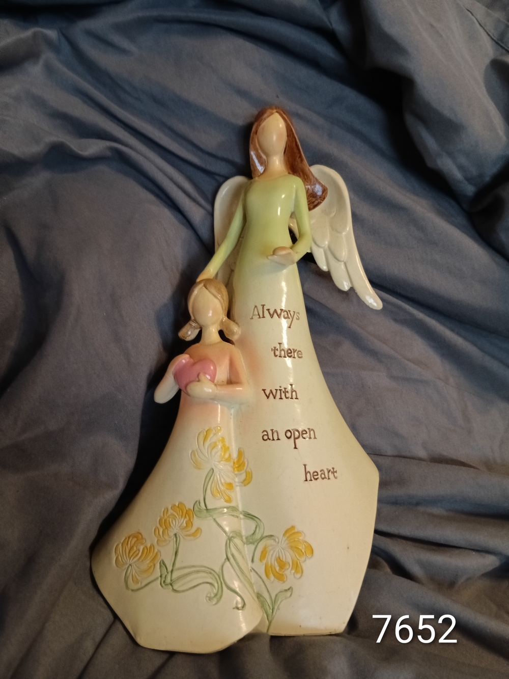 Angel Figurine And Little Girl Figurine